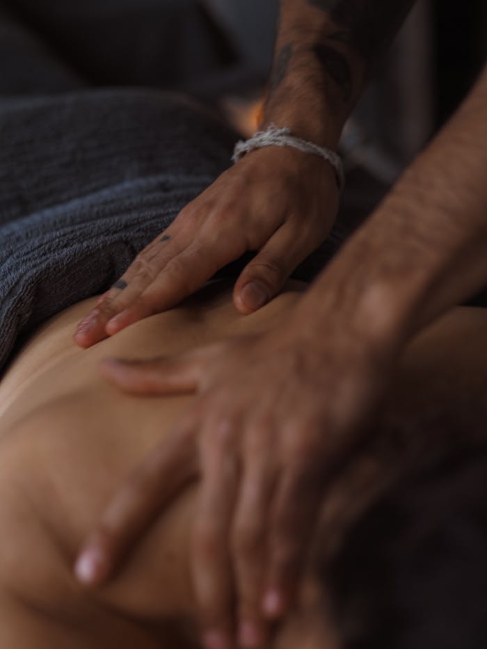 pexels photo 9268048 Close-up of hands giving a soothing massage in a spa setting.